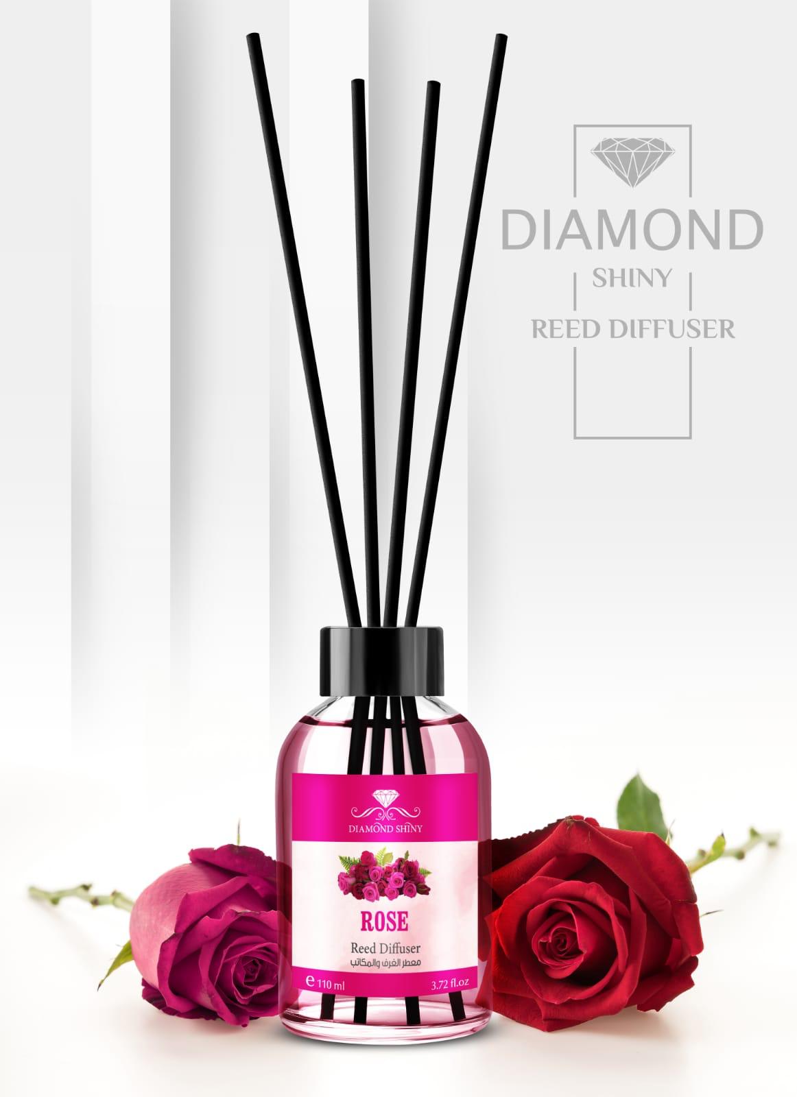 Rose reed diffuser with black reeds and pink fragrance oil
